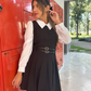 Vestido mini/maxi estilo preppy negro con camisa blanca y cinturón Jessie