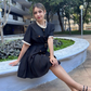 Vestido negro oversize con cinturón Nora